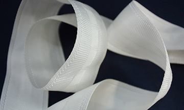 Self-pleating tape