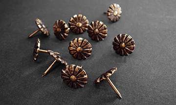 Patterned tacks for finishing