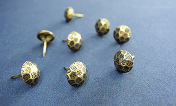 Patterned tacks for finishing