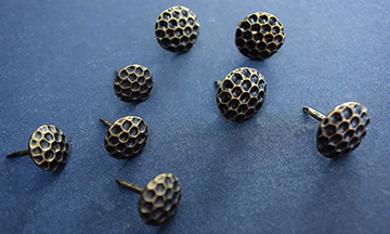 Patterned tacks for finishing
